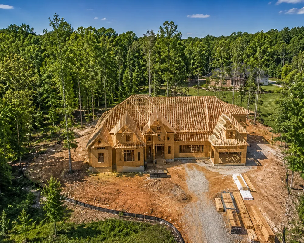 Custom home being built on a wooded lot in Wake County North Carolina.